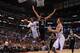 LOS ANGELES, CA - FEBRUARY 18: Chris Paul #3 of the Los Angeles Clippers shoots against Marco Belinelli #3 of the San Antonio Spurs at STAPLES Center on February 18, 2014 in Los Angeles, California. NOTE TO USER: User expressly acknowledges and agrees tha