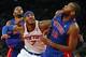 Jan 7, 2014; New York, NY, USA; New York Knicks small forward Carmelo Anthony (7) battles Detroit Pistons power forward Greg Monroe (10) and small forward Josh Smith (6) for rebound in closing seconds of game at Madison Square Garden. New York Knicks def
