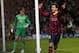 MANCHESTER, ENGLAND - FEBRUARY 18: Lionel Messi of Barcelona celebrates scoring the opening goal from a penalty kick during the UEFA Champions League Round of 16 first leg match between Manchester City and Barcelona at the Etihad Stadium on February 18,