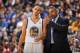 OAKLAND, CA - JANUARY 10: Head Coach Mark Jackson of the Golden State Warriors coaches player Stephen Curry #30 against the Boston Celtics on January 10, 2014 at Oracle Arena in Oakland, California. NOTE TO USER: User expressly acknowledges and agrees tha