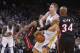 Feb 12, 2014; Oakland, CA, USA; Golden State Warriors forward David Lee (10) has the ball knocked out of his hands by Miami Heat guard Ray Allen (34) in the fourth quarter at Oracle Arena. The Heat defeated the Warriors 111-110. Mandatory Credit: Cary Edm