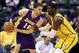 Feb 25, 2014; Indianapolis, IN, USA; Los Angeles Lakers center Paul Gasol (16) is guarded by Indiana Pacers center Roy Hibbert (55) at Bankers Life Fieldhouse. Indiana defeats Los Angeles 118-98. Mandatory Credit: Brian Spurlock-USA TODAY Sports