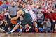 COLUMBUS, OH - MARCH 9: Aaron Craft #4 of the Ohio State Buckeyes defends against Denzel Valentine #45 of the Michigan State Spartans as the clock winds down on March 9, 2014 at Value City Arena in Columbus, Ohio. Craft caused Valentine to turn the ball