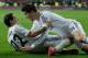 MADRID, SPAIN - FEBRUARY 05: Angel Di Maria (L) of Real Madrid CF celebrates scoring their third goal with teammate Alvaro B. Morata during the Copa del Rey semifinal first leg match between Real Madrid CF and Club Atletico Madrid at Estadio Santiago Ber
