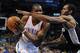 Apr 4, 2013; Oklahoma City, OK, USA; Oklahoma City Thunder forward Kevin Durant (35) handles the ball against San Antonio Spurs guard Kawhi Leonard (2) in the first half in Chesapeake Energy Arena. Mandatory Credit: Mark D. Smith-USA TODAY Sports