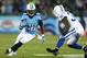 NASHVILLE, TN - NOVEMBER 14: Chris Johnson #28 of the Tennessee Titans carries the ball against the defense of Cassius Vaughn #32 of the Indianapolis Colts in the second quarter at LP Field on November 14, 2013 in Nashville, Tennessee. (Photo by Andy L