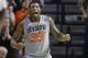 Oklahoma State guard Marcus Smart (33) celebrates during the second half of an NCAA college basketball game against Kansas in Stillwater, Okla., Saturday, March 1, 2014. Oklahoma State won 72-65. (AP Photo/Sue Ogrocki)