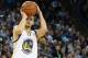 Feb 20, 2014; Oakland, CA, USA; Golden State Warriors point guard Stephen Curry (30) shoots a three point basket against the Houston Rockets during the overtime period at Oracle Arena. The Golden State Warriors defeated the Houston Rockets 102-99 in overt