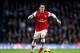 LONDON, ENGLAND - JANUARY 18: Mesut Oezil of Arsenal in action during the Barclays Premier League match between Arsenal and Fulham at Emirates Stadium on January 18, 2014 in London, England. (Photo by Clive Mason/Getty Images)