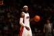MIAMI, FL - March 10: LeBron James #6 of the Miami Heat dribbles up the court against the Washington Wizards at the American Airlines Arena in Miami, Florida on March 10 2014. NOTE TO USER: User expressly acknowledges and agrees that, by downloading and/o