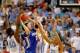 GREENSBORO, NC - MARCH 18: Doug McDermott #3 of the Creighton Bluejays looks to shoot over Harrison Barnes #40, Tyler Zeller #44 and James Michael McAdoo #43 of the North Carolina Tar Heels in the second half during the third round of the 2012 NCAA Men's