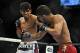 Nov 16, 2013; Las Vegas, NV, USA; Will Campuzano (red gloves) fights against Sergio Pettis (blue gloves) in their bantamweight bout during UFC 167 at MGM Grand Garden Arena. Mandatory Credit: Stephen R. Sylvanie-USA TODAY Sports