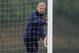 ST ALBANS, ENGLAND - MARCH 10: Arsenal manager Arsene Wenger moves the goalposts during the Arsenal training session at London Colney on March 10, 2014 in St Albans, England. (Photo by Michael Regan/Getty Images)