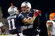 FOXBORO, MA - DECEMBER 8: Tom Brady #12 of the New England Patriots celebrates the game-winning touchdown with Julian Edelman #11 in the 4th quarter at Gillette Stadium on December 8, 2013 in Foxboro, Massachusetts. (Photo by Jim Rogash/Getty Images)