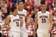 TUCSON, AZ - FEBRUARY 26: (L-R) Nick Johnson #13, Aaron Gordon #11 and Kaleb Tarczewski #35 of the Arizona Wildcats react after scoring against the California Golden Bears during the second half of the college basketball game at McKale Center on February