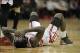 Mar 9, 2014; Houston, TX, USA; Houston Rockets point guard Patrick Beverley (2) lies on the court after being hit in the face during the overtime period against the Portland Trail Blazers at Toyota Center. Mandatory Credit: Andrew Richardson-USA TODAY Spo