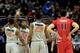KANSAS CITY, MO - MARCH 12: Marcus Smart #33 of the Oklahoma State Cowboys is congratulated by teammates Brian Williams #4 and Leyton Hammonds #23 after scoring and drawing a foul during the Big 12 Basketball Tournament first round game against the Texas