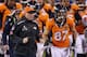 EAST RUTHERFORD, NJ - FEBRUARY 02: (L-R) Head coach John Fox of the Denver Broncos and wide receiver Eric Decker #87 run off the field at the end of the half during Super Bowl XLVIII at MetLife Stadium on February 2, 2014 in East Rutherford, New Jersey.