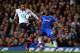 LONDON, ENGLAND - MARCH 08: Sandro of Spurs and Samuel Eto'o of Chelsea compete for the ball during the Barclays Premier League match between Chelsea and Tottenham Hotspur at Stamford Bridge on March 8, 2014 in London, England. (Photo by Clive Rose/Gett
