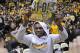 WICHITA, KS - MARCH 01: Forward Cleanthony Early #11 of the Wichita State Shockers celebrates after beating the Missouri State Bears on March 1, 2014 at Charles Koch Arena in Wichita, Kansas. Wichita State won 68-45. (Photo by Peter Aiken/Getty Images)