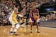 INDIANAPOLIS, IN - MARCH 15: Kobe Bryant #24 of the Los Angeles Lakers looks to shoot against Paul George #24 of the Indiana Pacers on March 15, 2013 at Bankers Life Fieldhouse in Indianapolis, Indiana. NOTE TO USER: User expressly acknowledges and agree