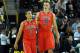 EUGENE, OR - MARCH 8: Nick Johnson #13 and Kaleb Tarczewski #35 of the Arizona Wildcats walk off the court during the second half of the game against the Oregon Ducks at Matthew Knight Arena on March 8, 2014 in Eugene, Oregon. Oregon won the game 64-57. (