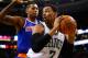 BOSTON, MA - MARCH 12: Jared Sullinger #7 of the Boston Celtics is defended by Jeremy Tyler #4 of the New York Knicks in the second half during the game at TD Garden on March 12, 2014 in Boston, Massachusetts. NOTE TO USER: User expressly acknowledges and