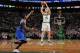 BOSTON, MA - MARCH 12: Kelly Olynyk #41 of the Boston Celtics shoots against the New York Knicks on March 12, 2014 at the TD Garden in Boston, Massachusetts. NOTE TO USER: User expressly acknowledges and agrees that, by downloading and or using this phot