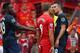 LIVERPOOL, ENGLAND - SEPTEMBER 01: Steven Gerrard of Liverpool exchanges words with Robin van Persie of Manchester United during the Barclays Premier League match between Liverpool and Manchester United at Anfield on September 01, 2013 in Liverpool, Engl