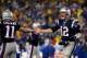 FOXBORO, MA - JANUARY 11: Tom Brady #12 of the New England Patriots reacts with teammate Julian Edelman #11 after a play against the Indianapolis Colts during the AFC Divisional Playoff game at Gillette Stadium on January 11, 2014 in Foxboro, Massachuse