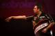 LONDON, ENGLAND - DECEMBER 30: Adrian Lewis of England in action during his semi final match against Michael van Gerwen of The Netherlands on day fifteen of the Ladbrokes.com World Darts Championship at Alexandra Palace on December 30, 2013 in London, Eng