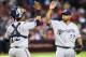 PHOENIX, AZ - JULY 14: Relief pitcher Francisco Rodriguez #57 of the Milwaukee Brewers high fives catcher Martin Maldonado #12 after defeating the Arizona Diamondbacks in the MLB game at Chase Field on July 14, 2013 in Phoenix, Arizona. The Brewers defea