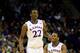 KANSAS CITY, MO - MARCH 13: Andrew Wiggins #22 of the Kansas Jayhawks is congratulated by Wayne Selden, Jr. #1 after dunking on an alley-oop during the Big 12 Basketball Tournament quarterfinal game against the Oklahoma State Cowboys at Sprint Center on