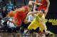 EUGENE, OR - MARCH 8: Nick Johnson #13 of the Arizona Wildcats goes after a loose ball with Waverly Austin #20 of the Oregon Ducks during the second half of the game at Matthew Knight Arena on March 8, 2014 in Eugene, Oregon. Oregon won the game 64-57. (P