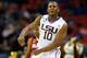 ATLANTA, GA - MARCH 13: Andre Stringer #10 of the LSU Tigers reacts after hitting a three-point basket against the Alabama Crimson Tide during the second round of the SEC Men's Basketball Tournament at Georgia Dome on March 13, 2014 in Atlanta, Georgia.