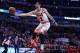 Mar 13, 2014; Chicago, IL, USA; Chicago Bulls guard Kirk Hinrich (12) grabs a rebound against the Houston Rockets during the first quarter at the United Center. Mandatory Credit: Mike DiNovo-USA TODAY Sports