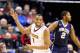 INDIANAPOLIS, IN - MARCH 13: Andre Hollins #1 of the Minnesota Golden Gophers celebrates after hitting a three point shot in the game against the Penn State Nittany Lions during the first round of the Big Ten Basketball Tournament at Bankers Life Fieldho