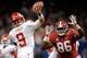 NEW ORLEANS, LA - JANUARY 02: Trevor Knight #9 of the Oklahoma Sooners is pressured by A'Shawn Robinson #86 of the Alabama Crimson Tide during the Allstate Sugar Bowl at the Mercedes-Benz Superdome on January 2, 2014 in New Orleans, Louisiana. (Photo by