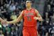 EUGENE, OR - MARCH 8: Nick Johnson #13 of the Arizona Wildcats is greeted at the bench during the first half of the game against the Oregon Ducks at Matthew Knight Arena on March 8, 2014 in Eugene, Oregon. (Photo by Steve Dykes/Getty Images)