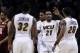 NEW YORK, NY - DECEMBER 28: Treveon Graham #21 of the Virginia Commonwealth Rams is congratulated by teammate Jordan Burgess #20 of the Virginia Commonwealth Rams against the Boston College Eagles during the Brooklyn Hoops Winter Festival at Barclays Cent
