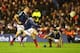 EDINBURGH, SCOTLAND - MARCH 08: Jean Marc Doussain of France kicks the last minute match winning penalty during the RBS Six Nations match between Scotland and France at Murrayfield Stadium on March 8, 2014 in Edinburgh, Scotland. (Photo by David Rogers/