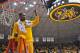 WICHITA, KS - FEBRUARY 22: Forward Cleanthony Early #11 of the Wichita State Shockers cut down the net after beating the Drake Bulldogs to win the Missouri Valley Conference on February 22, 2014 at Charles Koch Arena in Wichita, Kansas. Wichita State wo
