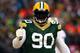 GREEN BAY, WI - JANUARY 05: B.J. Raji #90 of the Green Bay Packers celebrates a incomplete pass by the San Francisco 49ers in the first quarter during their NFC Wild Card Playoff game at Lambeau Field on January 5, 2014 in Green Bay, Wisconsin. (Photo
