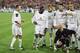 18 Apr 2001: Karl Power a Manchester United supporter becomes an instant legend as he is spotted by Manchester United players after being in the team group posing as Eric Cantona before the UEFA Champions League Quarter Finals second leg match between Ba