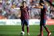 VALLADOLID, SPAIN - MARCH 08: Lionel Messi (L) of FC Barcelona lines up a free kick with Xavi Hernandez during the La Liga match between Real Valladolid CF and FC Barcelona at estadio Nuevo Jose Zorillo on March 8, 2014 in Valladolid, Spain. (Photo by D