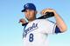 SURPRISE, AZ - FEBRUARY 24: Mike Moustakas #8 of the Kansas City Royals poses for a portrait during spring training photo day at Surprise Stadium on February 24, 2014 in Surprise, Arizona. (Photo by Christian Petersen/Getty Images)