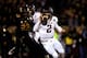 COLUMBIA, MO - NOVEMBER 30: Quarterback Johnny Manziel #2 of the Texas A&M Aggies scrambles as defensive lineman Markus Golden #33 of the Missouri Tigers persues during the game on November 30, 2013 in Columbia, Missouri. (Photo by Jamie Squire/Getty Im