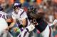 CHICAGO, IL - NOVEMBER 25: Henry Melton #69 of the Chicago Bears hits Christian Ponder #7 of the Minnesota Vikings at Soldier Field on November 25, 2012 in Chicago, Illinois. The Bears defeated the Vikings 28-10. (Photo by Jonathan Daniel/Getty Images)