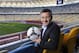 KIEV, UKRAINE - DECEMBER 02: Herbert Hainer, CEO adidas Group poses with the adidas Tango 12, the official matchball for the UEFA Euro 2012 tournament at the Olympiyskiy Stadium on December 2, 2011 in Kiev, Ukraine. (Photo by Gary Prior/Getty Images for