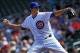 Mar 4, 2014; Mesa, AZ, USA; Chicago Cubs starting pitcher Kyle Hendricks (79) throws to the Oakland Athletics in the first inning of their spring training baseball game at Cubs Park. Mandatory Credit: Lance Iversen-USA TODAY Sports.
